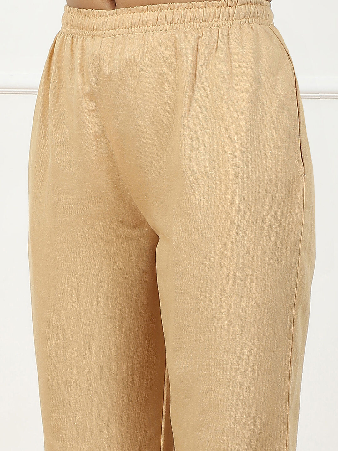 Beige Solid Mid-Rise Regular Pants image number 1