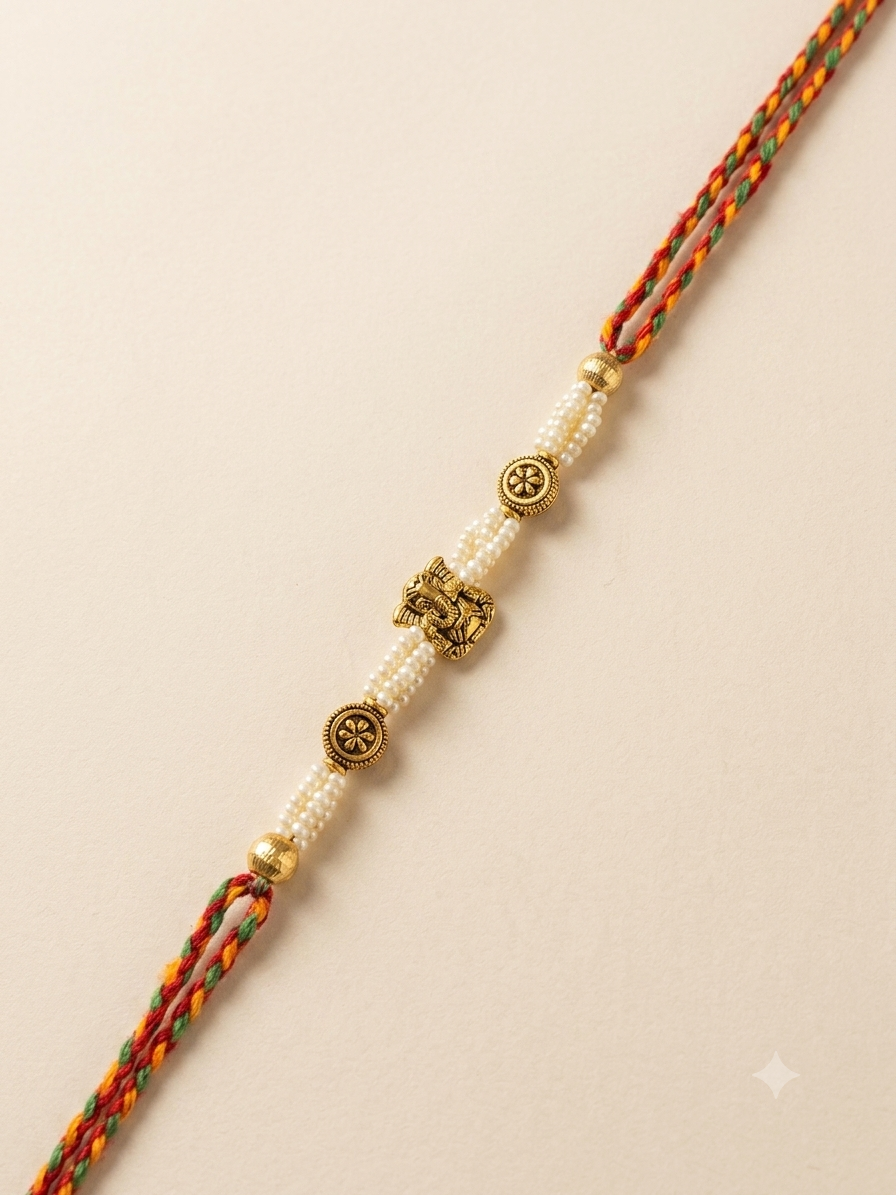 Multlicolor Moti Vinayak Antique Gold Rakhi image number 0