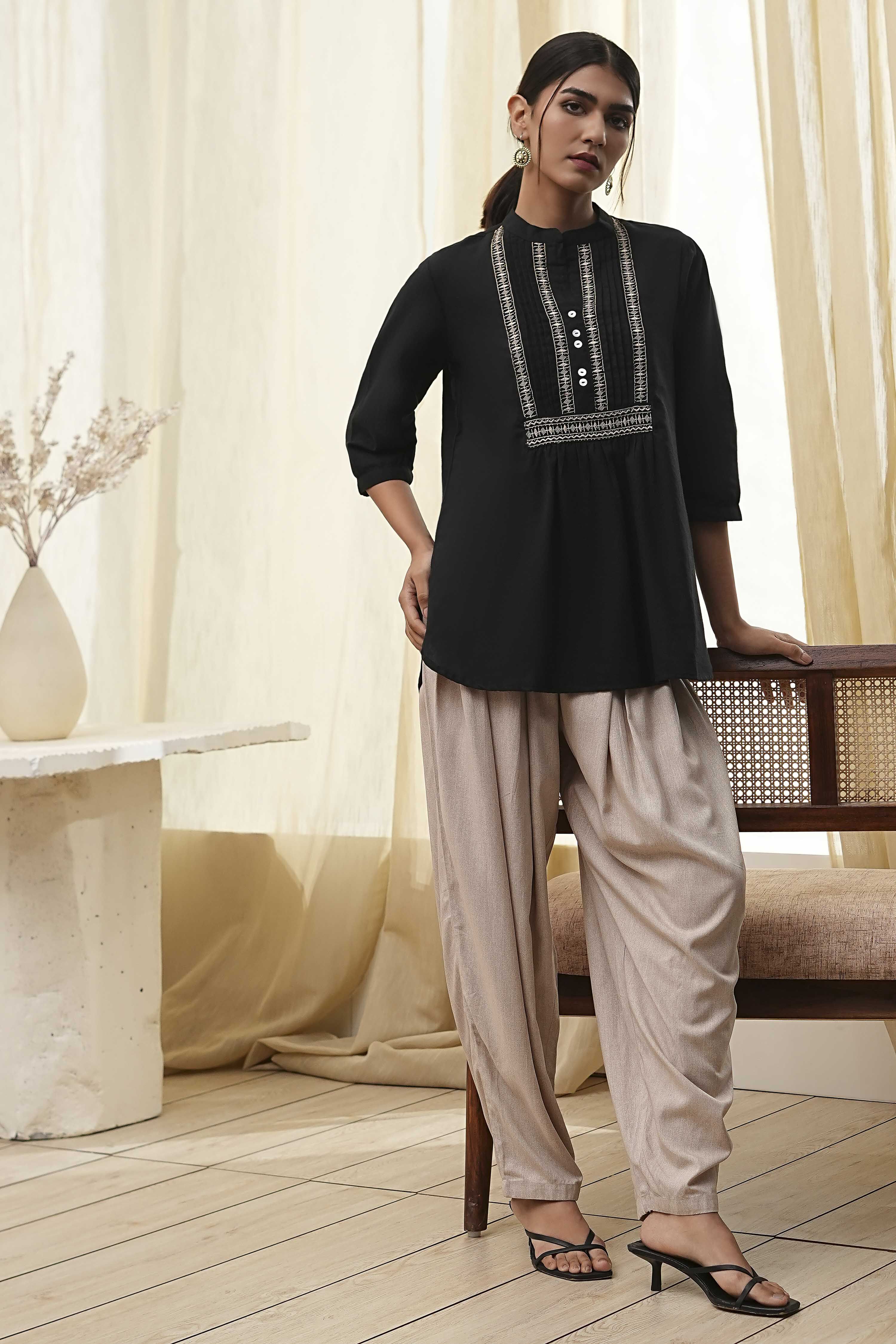 Beige Solid Straight Palazzos image number 0