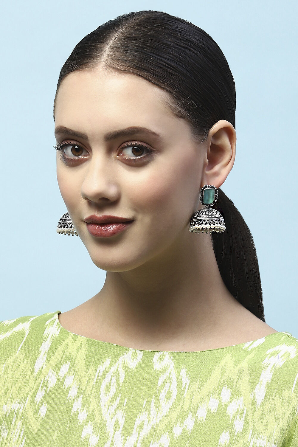 Mint Green Oxidised Stone Studded Jhumkas image number 1