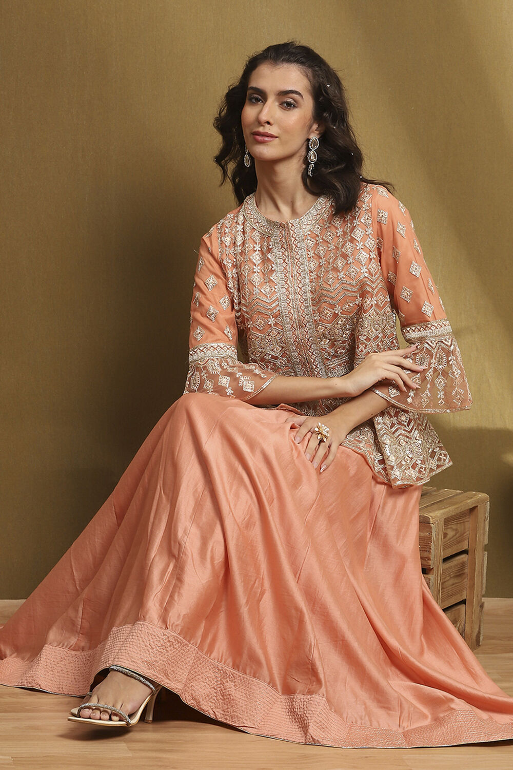 Peach Net Embroidered Peplum Kurta Lehenga Set image number 0