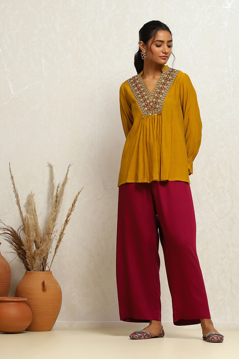 Mustard Yellow Embroidered A-Line Kurti image number 0