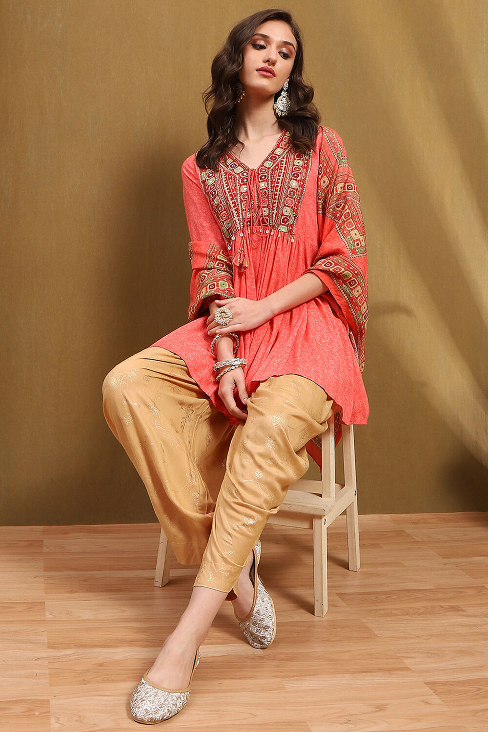 Peach-Toned and Beige Embroidered Peplum Kurta Set image number 0