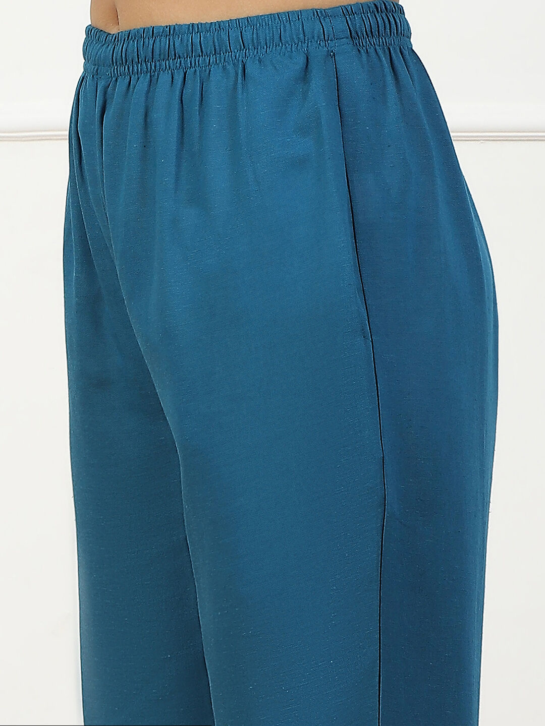 Beige Solid Mid-Rise Regular Pants image number 1