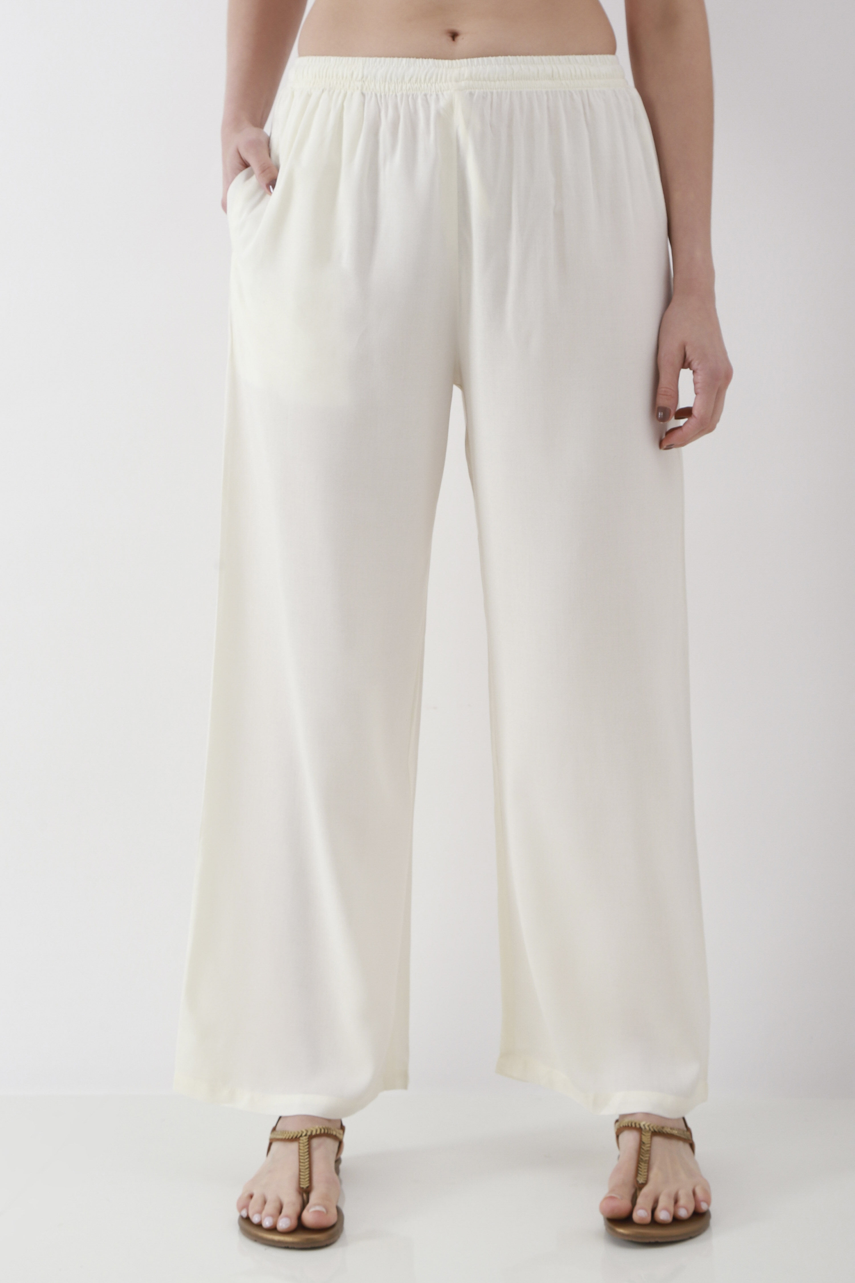 Off-White Solid Straight Palazzos image number 4