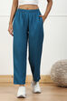 Beige Solid Mid-Rise Regular Pants image number 4