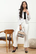 Beige Solid Stretchable Relaxed Fit Pants image number 0
