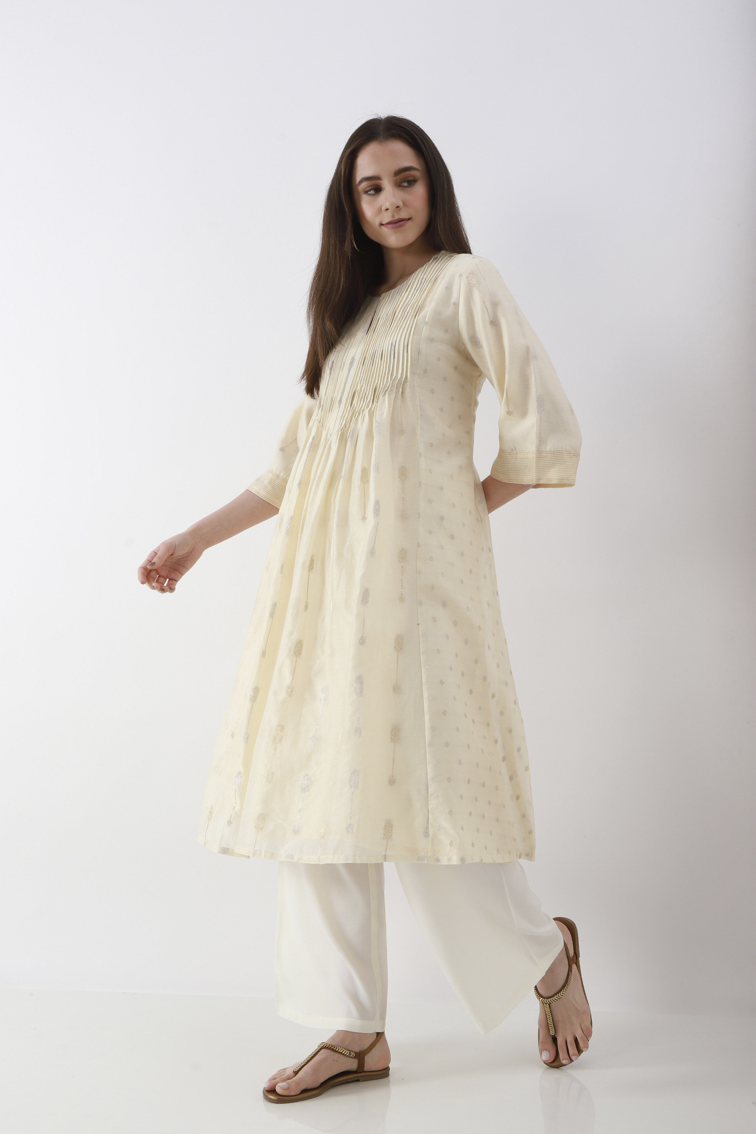 Off-White Solid Straight Palazzos image number 0