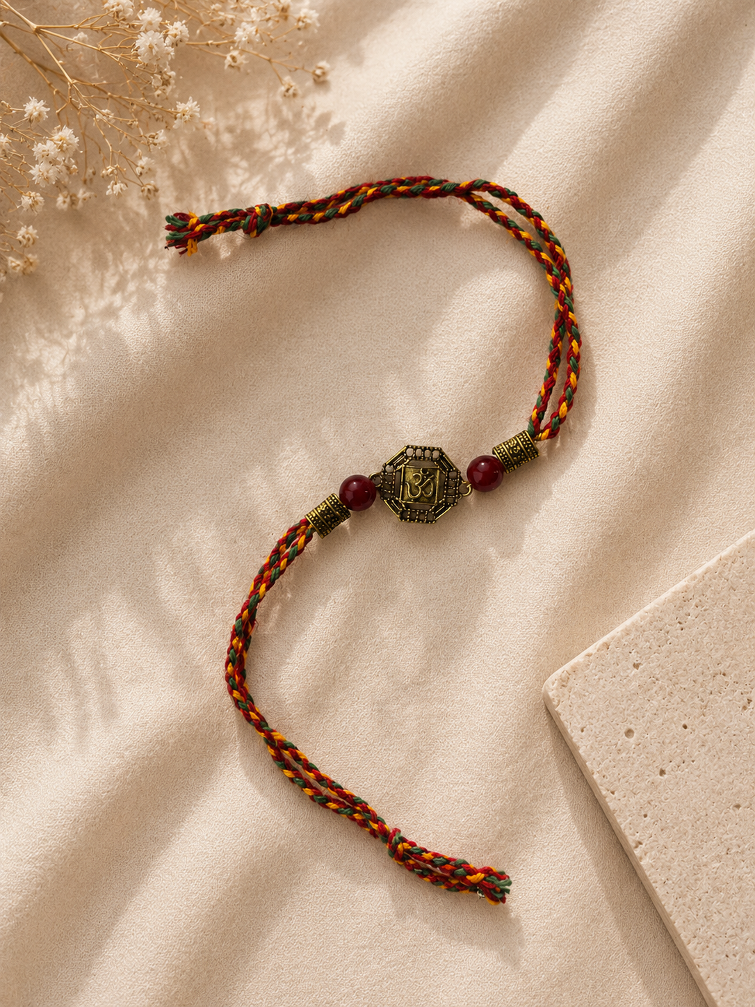 Multlicolor OM Shkti Antique Gold Rakhi image number 1