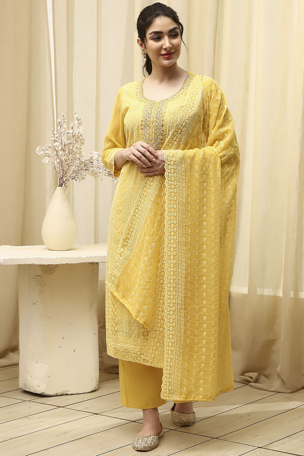 Yellow Georgette Schiffli Unstitched Suit Set image number 1