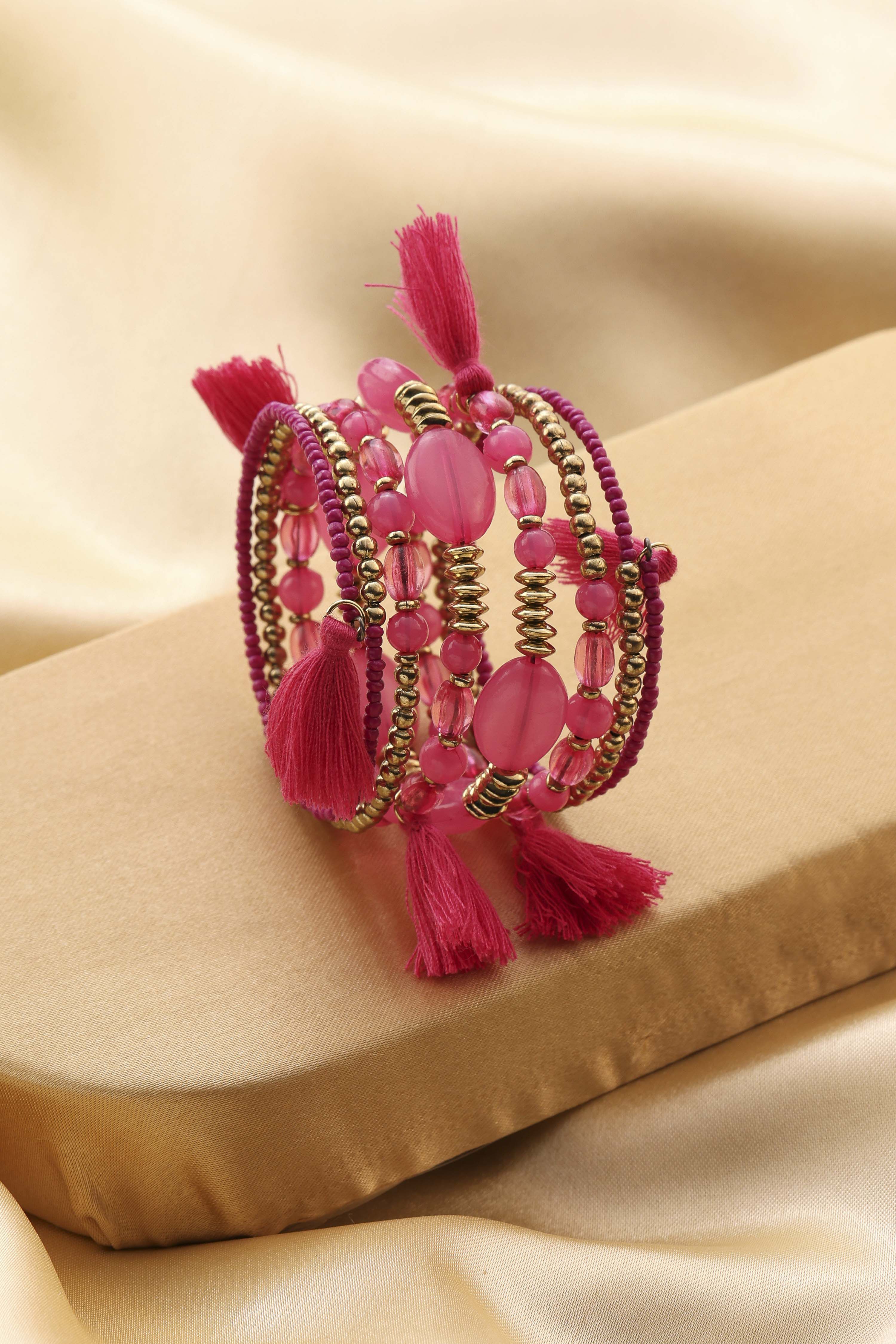 Pink Plastic Warp Around Beaded Bangle image number 0