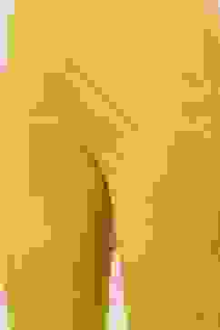 Yellow Solid Asymmetric Kurta Slim Pants Suit Set image number 2