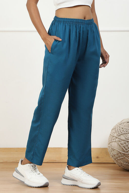 Beige Solid Mid-Rise Regular Pants image number 3