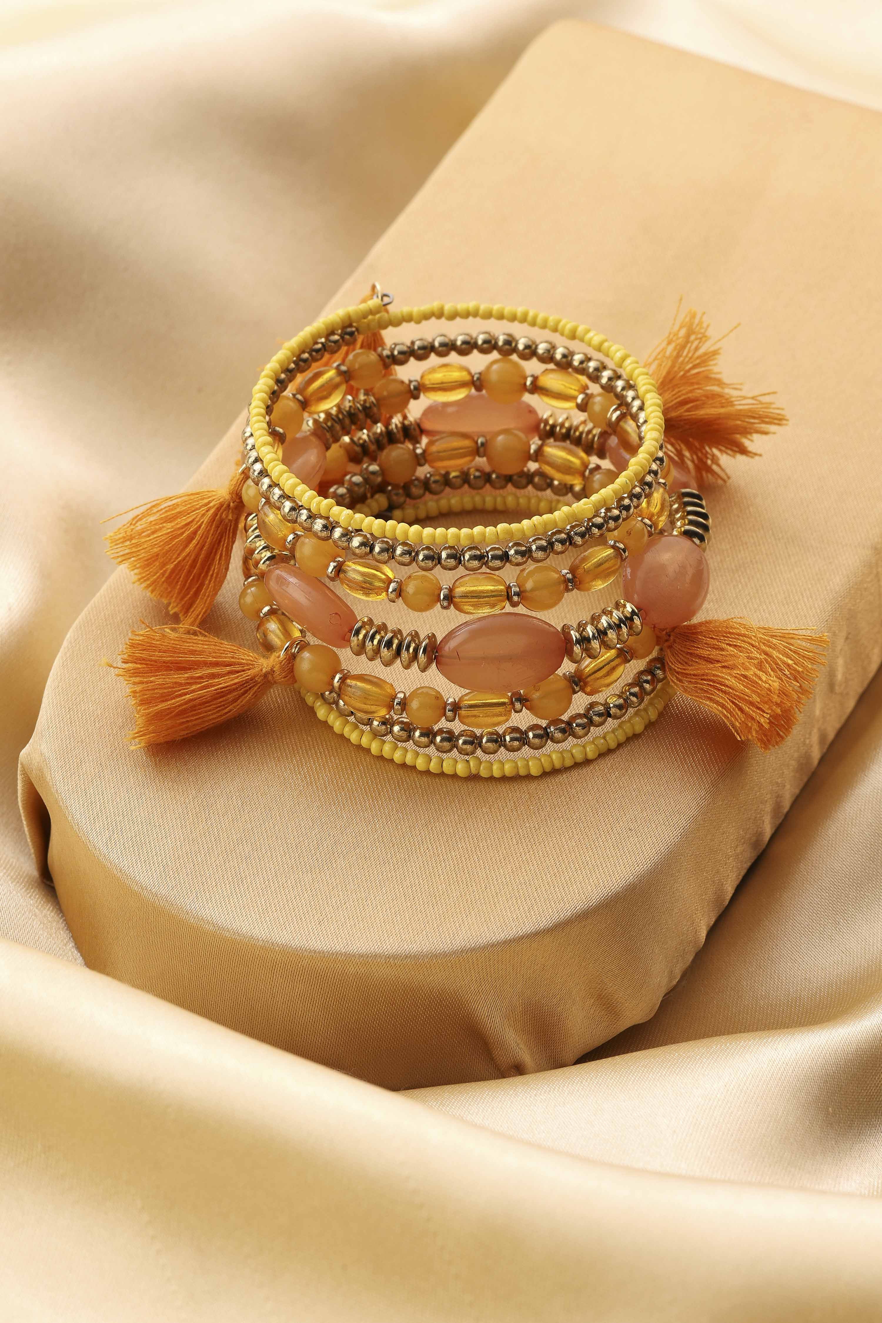 Yellow Beaded Plastic Wrap Around Bangle image number 2