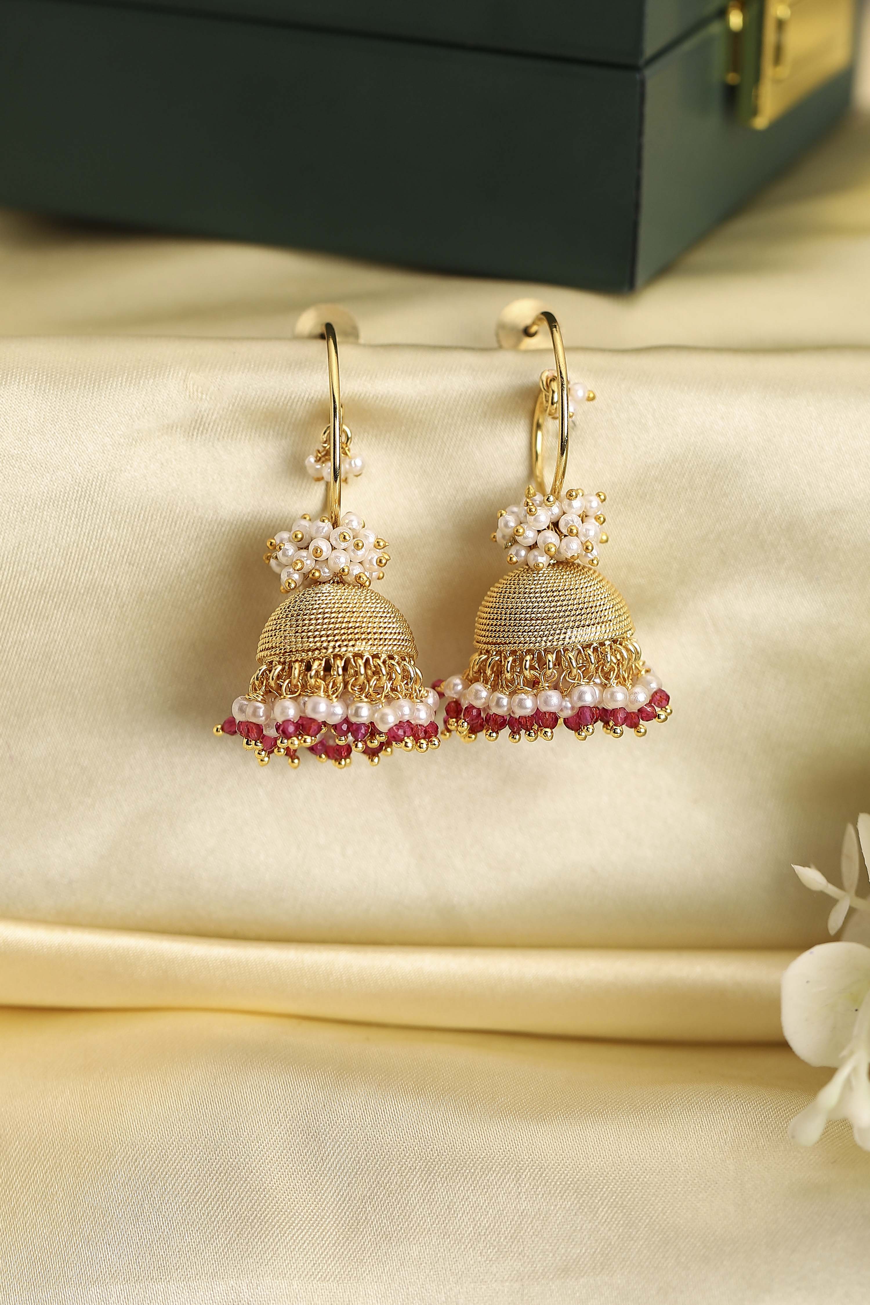 Pink Gold Plated Brass Pearl Studded Jhumkas image number 0